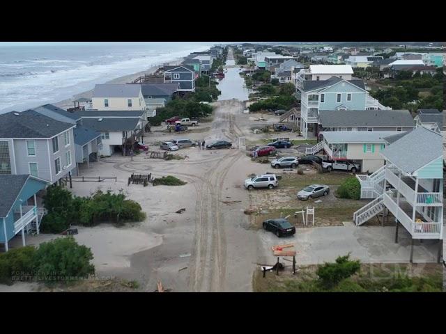 8-4-2020 Oak Island, NC Hurricane Isaias drone aftermath at first light shows city covered in sand