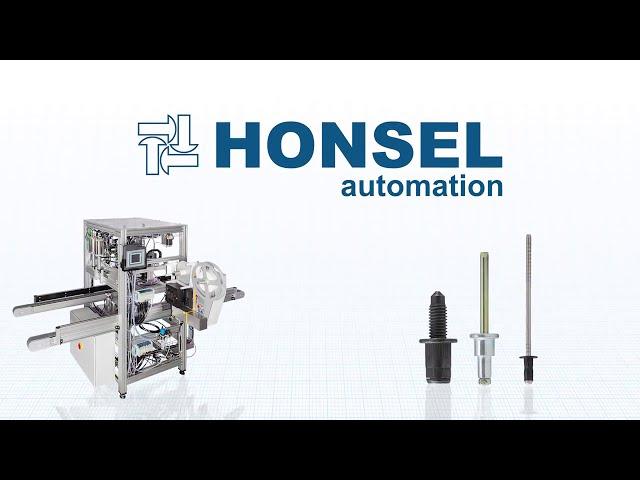 HONSEL Automation. Handarbeitsplatzfür die Montage von Federbeinstützen.