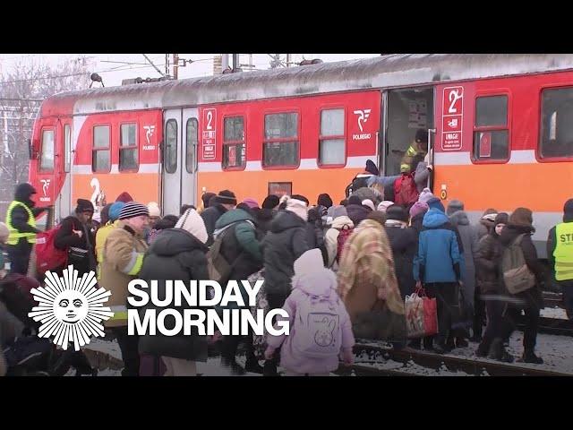 Ukrainian refugees flee war at home