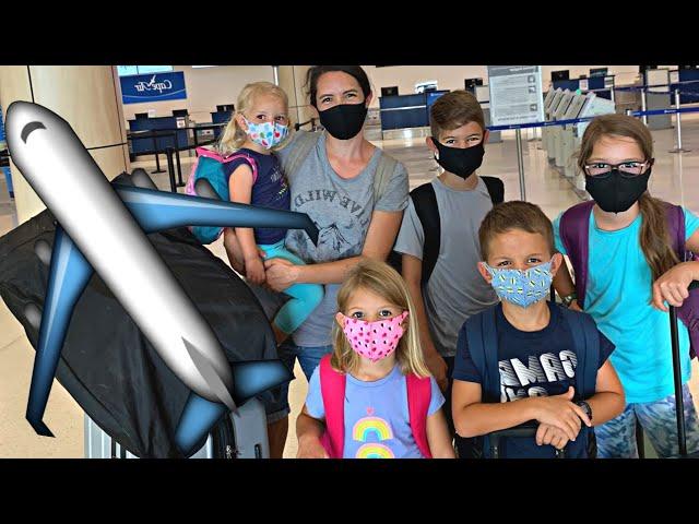 Solo Flight with 5 Kids Amidst a Pandemic: Our Family's Adventure!