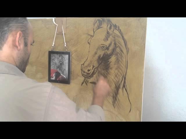 Omar Ortiz pintando la obra los caballos de Da Vinci Hiperrealismo Hyperrealism oil paint