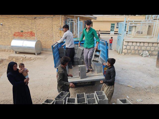 "Brother Ibrahim: Bringing blocks to Suzan's house, by Reza"