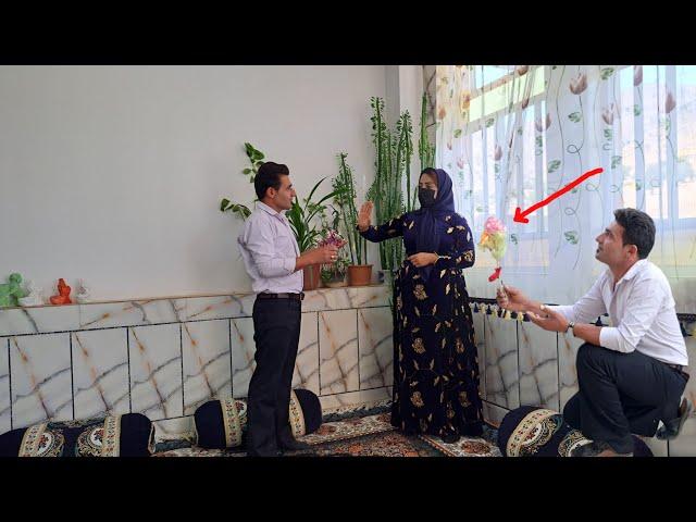 Changing the model of the lawyer's dress and giving flowers to the lawyer by Ruhollah