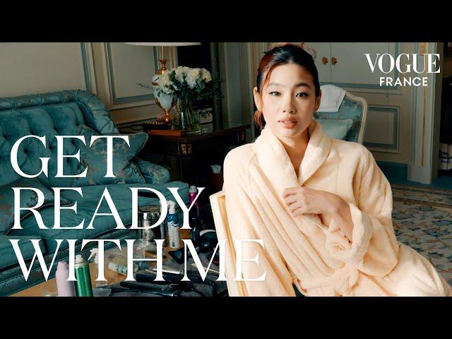 Hoyeon gets ready for the Louis Vuitton show during Paris Fashion Week | Vogue France