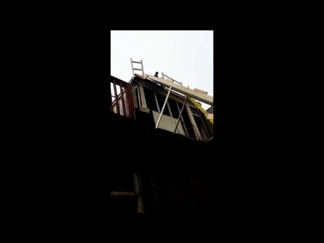 Chute build for flat roof replacement in Toronto on the Danforth.