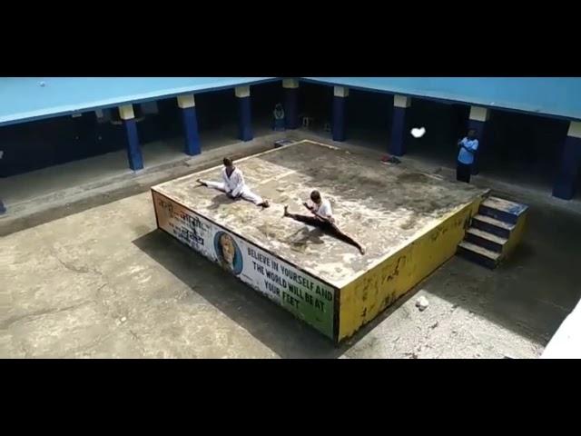 G.m.Public School Chaita Gomoh doing stretching with taekwondo boy