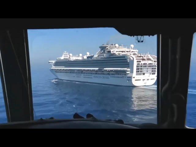 Il-38N flies near the US cruise ship Sapphire Princess