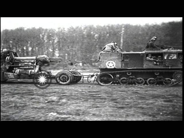 US troops set up 155mm Gun (Long Tom) and  M4 High Speed Tractor tows another one...HD Stock Footage