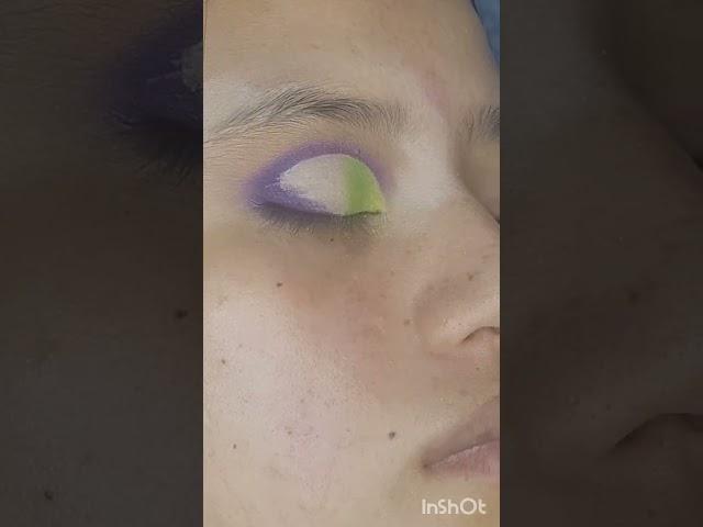 mehendi look peacock feathers inspired green and purple cut crease eye makeup look 
