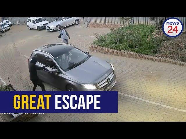 WATCH: Gun-wielding hijackers outsmarted by fast-thinking driver