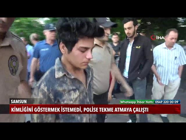 Kimliğini göstermek istemeyen genç, polislere tekme atmaya çalıştı