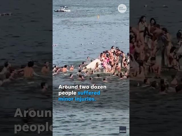 Moment a pier holding dozens of Wisconsin college students suddenly collapses into lake