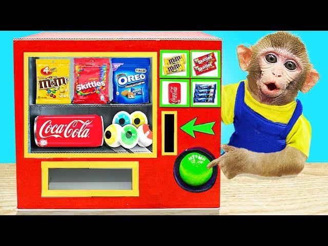 Baby Monkey KiKi playing with Candy Vending Machine so funny | KUDO ANIMAL KIKI