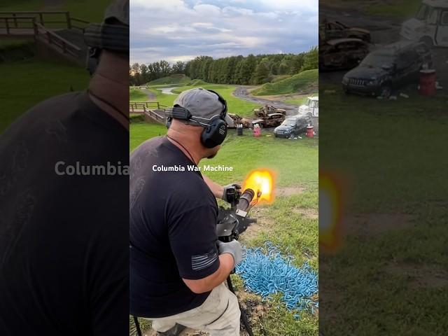 Shooting M134 Mini Gun from the hip.                              Columbia War Machine