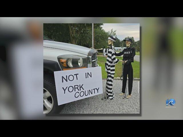 Local woman uses Halloween decor to spread message