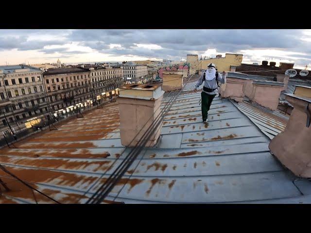 Rooftop walkers : colored graffiti on the main street