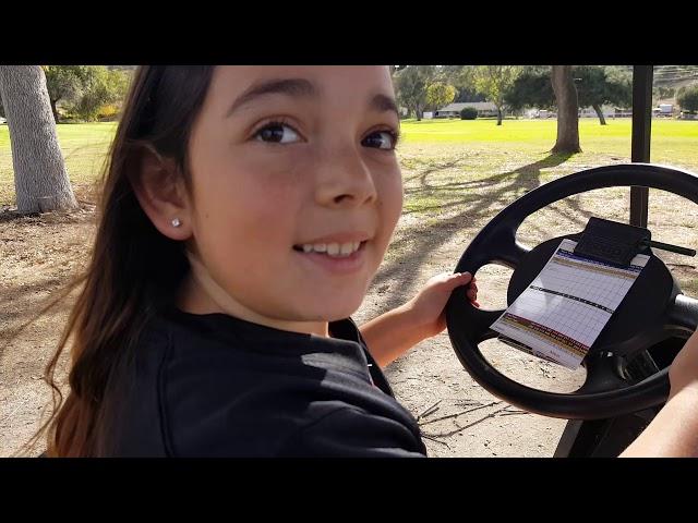 Megan Driving Golf Cart