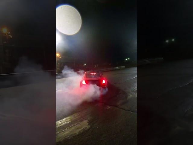 350z DOES BURNOUT ACROSS ENTIRE TRACK IN THE RAIN