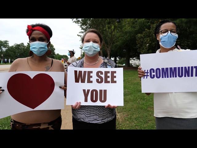 UNC Medical Center and UNC REX employees demonstrate their commitment to health equity. (UNC Health)