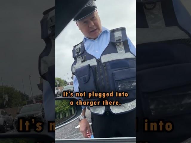 Parking ticket officer wrongfully giving a man a parking fine in a Tesla