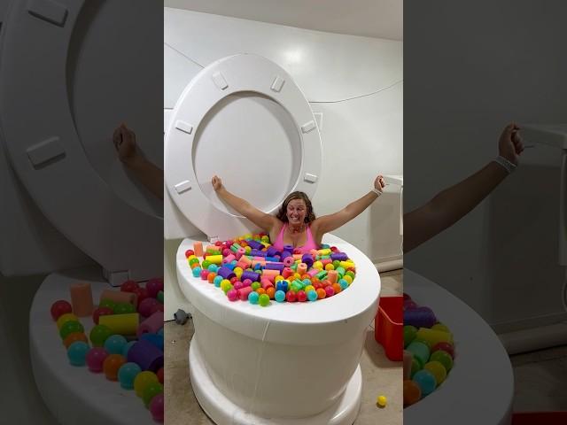 GOING UNDER and OVERFLOWING the Giant Toilet Colorful Pool #shorts