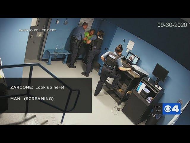 Video shows two De Soto officers beating, kicking man in groin at police station