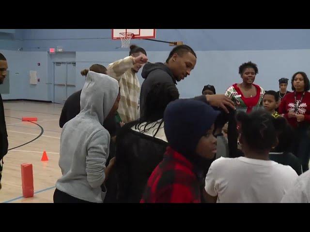 Browns QB Dorian Thompson-Robinson visits Boys & Girls Club for holiday giveback