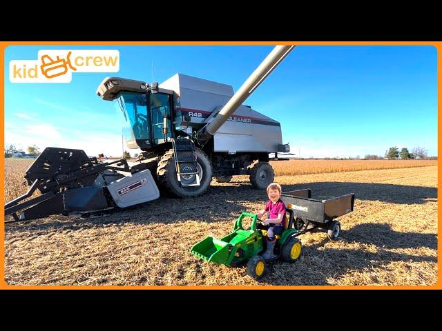 Harvesting crops with kids power wheel tractor & real combine harvester, farm Educational | Kid Crew