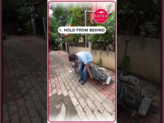 How to pick up a fallen motorcycle safely