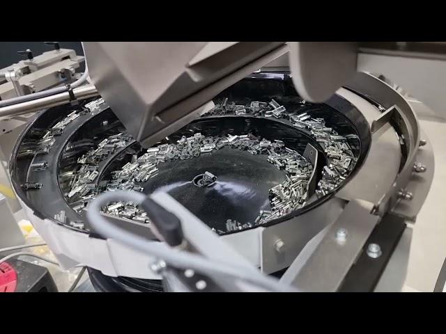 Bowl Feeder feeds and orientates Automotive Panel Fasteners | RNA Automation