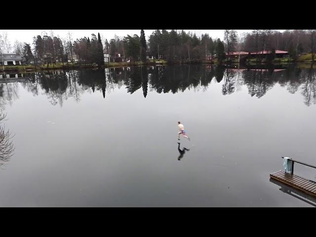 Race to the 'Finnish' Line: Man Sprints Across Frozen Lake in Finland