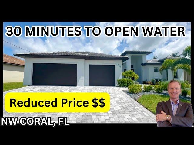 NEW CONSTRUCTION 30 MINUTES TO OPEN WATER REDUCED TO SELL #220 | NW CAPE CORAL FL