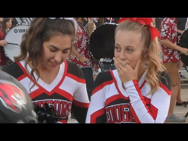 Football players' kind gesture to cheerleader goes viral