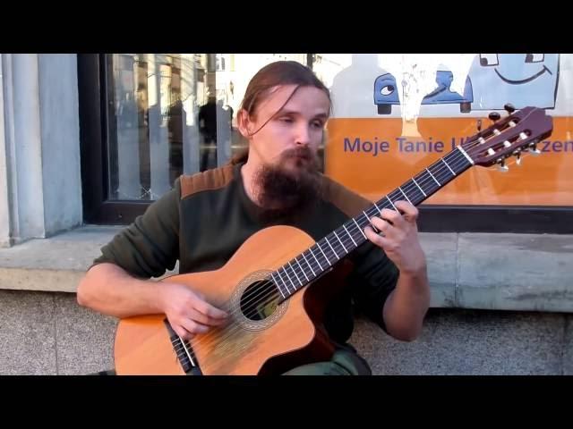 Amazing Street Guitarist Mariusz goli - Black Pearl Theme impro