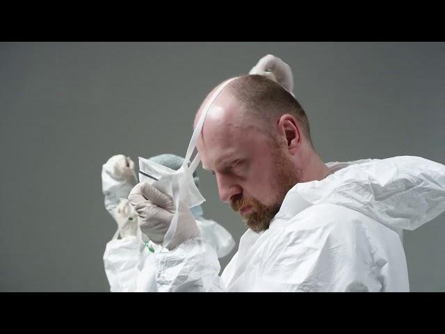 Порядок надевания одноразового защитного комбинезона  COVID 19