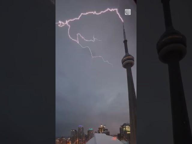 Watch lightning strike the CN Tower during severe weather #toronto #lightning #cntower