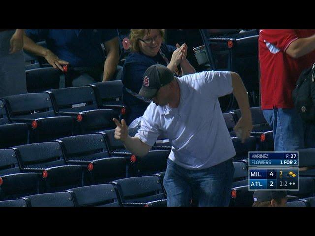 MIL@ATL: Fan gets ball, does Ric Flair dance