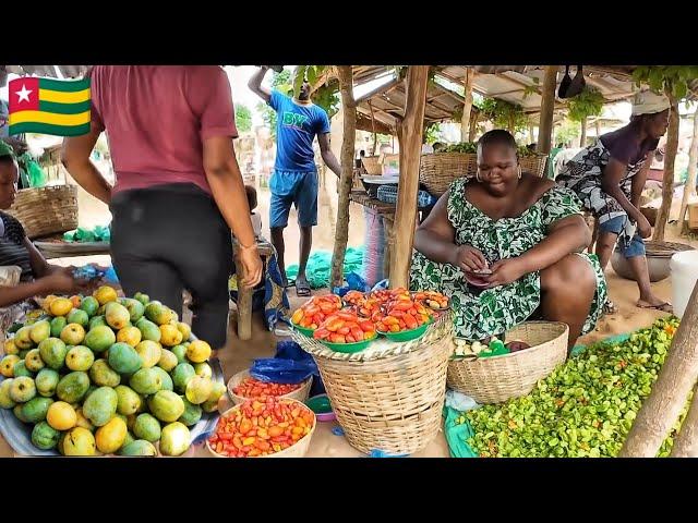 Rural African village market day in Togoville West Africa. Cost of living in an African village 2024