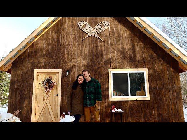 Millennials Build Off Grid Cabin Debt Free: Self Sufficient Living. No Plumbing. Solar Power.