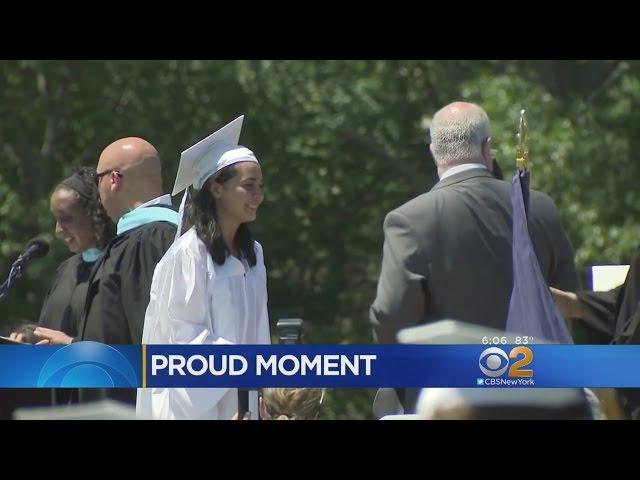 Officer Attends Graduation Of Girl He Saved Six Years Ago