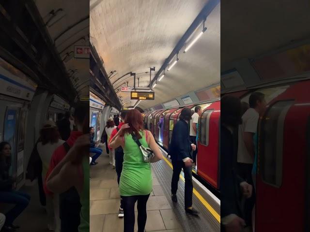 ARSENAL FANS IN LONDON UNDERGROUND