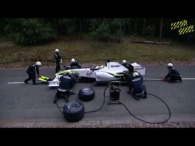 A bear attacks Brawn GP while they make a pitstop...