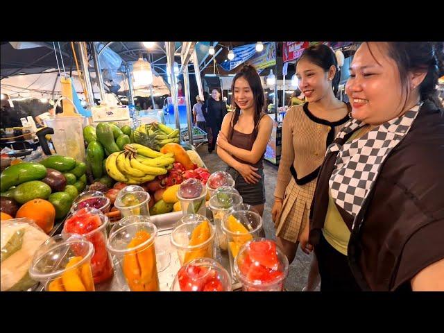 Beautiful night out with Lao ladies at the famous night market in Laos.