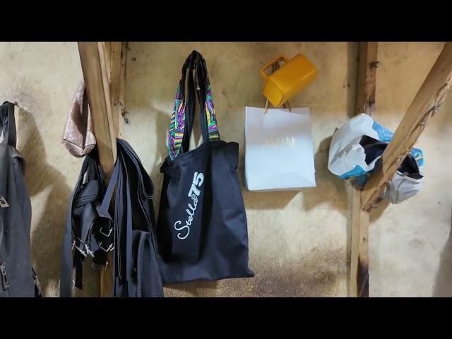 Mr. Muri cuts and sew bag in Mushin Leather Market Lagos