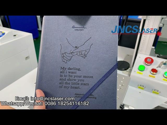 high speed co2 laser marking machine for leather notebook， leather engraving, jncslaser