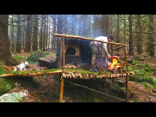 bushcraft natural shelter ,making mud bricks  ,log walls ,winter time in ireland