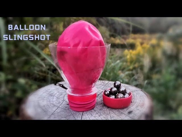 Weak balloon,strong power! How to make a pocket slingshot with plastic bottle and balloon.