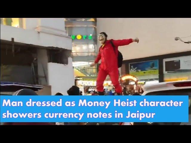 WATCH - Man dressed as Money Heist character showers currency notes in Jaipur