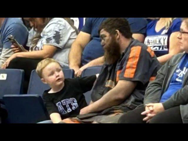 Coal Miner Covered in Dust Takes His Son to Basketball Game