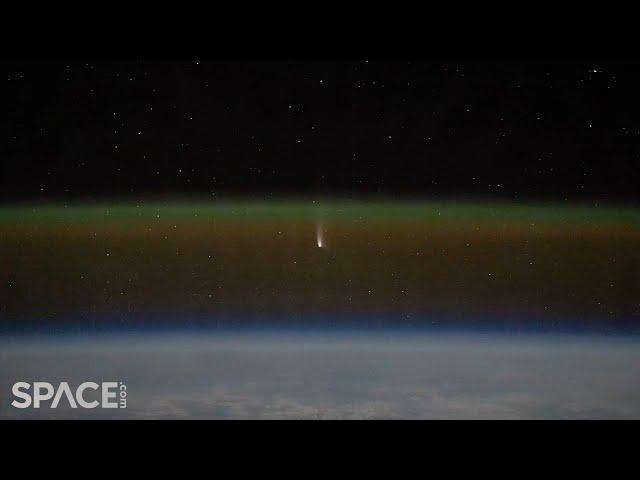 Whoa! Comet and unidentified satellite seen from space in amazing time-lapse